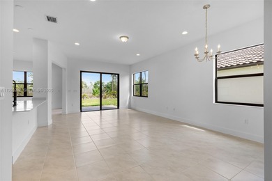 Built in 2024 and impeccably maintained, this stunning 3-bedroom on Panther Run Golf Club in Florida - for sale on GolfHomes.com, golf home, golf lot