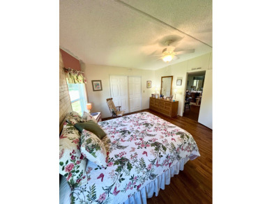 Move right into this furnished two-bedroom, two-bath home on Pine Lakes Country Club in Florida - for sale on GolfHomes.com, golf home, golf lot