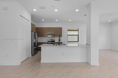 Built in 2024 and impeccably maintained, this stunning 3-bedroom on Panther Run Golf Club in Florida - for sale on GolfHomes.com, golf home, golf lot