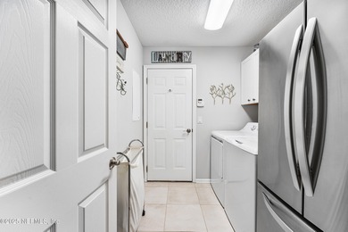 Discover the Palencia lifestyle in this beautifully maintained on The Palencia Club in Florida - for sale on GolfHomes.com, golf home, golf lot