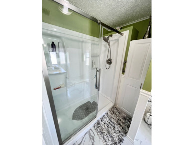Move right into this furnished two-bedroom, two-bath home on Pine Lakes Country Club in Florida - for sale on GolfHomes.com, golf home, golf lot