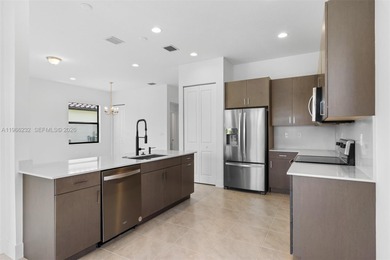 Built in 2024 and impeccably maintained, this stunning 3-bedroom on Panther Run Golf Club in Florida - for sale on GolfHomes.com, golf home, golf lot