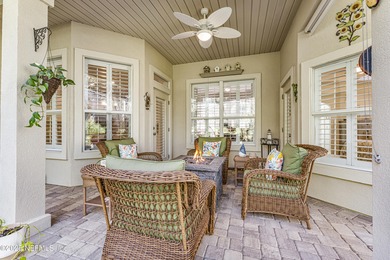 Discover the Palencia lifestyle in this beautifully maintained on The Palencia Club in Florida - for sale on GolfHomes.com, golf home, golf lot