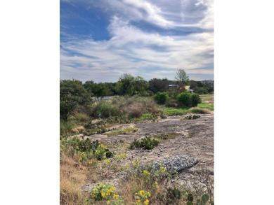 Situated near the lake, this lot is located in a highly sought on Slick Rock Golf Course - Horseshoe Bay in Texas - for sale on GolfHomes.com, golf home, golf lot