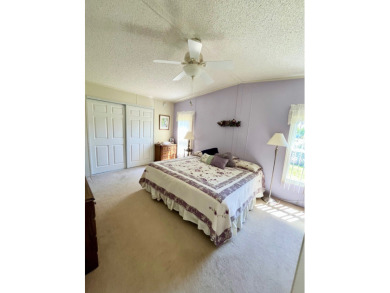 Move right into this furnished two-bedroom, two-bath home on Pine Lakes Country Club in Florida - for sale on GolfHomes.com, golf home, golf lot