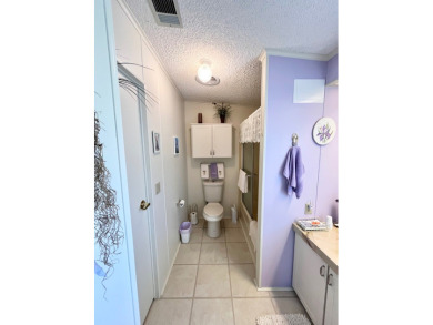 Move right into this furnished two-bedroom, two-bath home on Pine Lakes Country Club in Florida - for sale on GolfHomes.com, golf home, golf lot