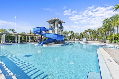 Discover the Palencia lifestyle in this beautifully maintained on The Palencia Club in Florida - for sale on GolfHomes.com, golf home, golf lot