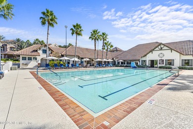 Discover the Palencia lifestyle in this beautifully maintained on The Palencia Club in Florida - for sale on GolfHomes.com, golf home, golf lot