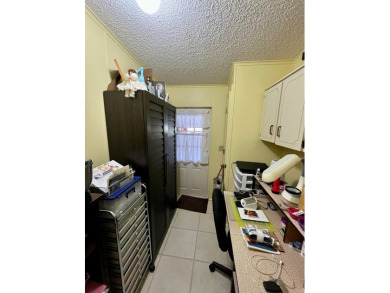 Move right into this furnished two-bedroom, two-bath home on Pine Lakes Country Club in Florida - for sale on GolfHomes.com, golf home, golf lot