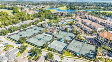 Discover the Palencia lifestyle in this beautifully maintained on The Palencia Club in Florida - for sale on GolfHomes.com, golf home, golf lot