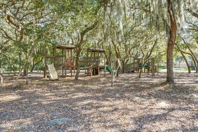 Discover the Palencia lifestyle in this beautifully maintained on The Palencia Club in Florida - for sale on GolfHomes.com, golf home, golf lot