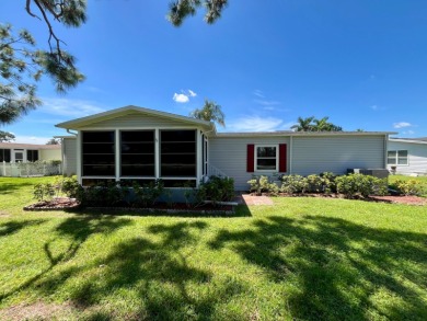 Move right into this furnished two-bedroom, two-bath home on Pine Lakes Country Club in Florida - for sale on GolfHomes.com, golf home, golf lot