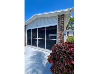 Move right into this furnished two-bedroom, two-bath home on Pine Lakes Country Club in Florida - for sale on GolfHomes.com, golf home, golf lot