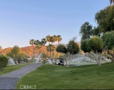 Arguably the most noticeable lot at the Ranch, lot 411 sits in on Rancho California RV Resort in California - for sale on GolfHomes.com, golf home, golf lot