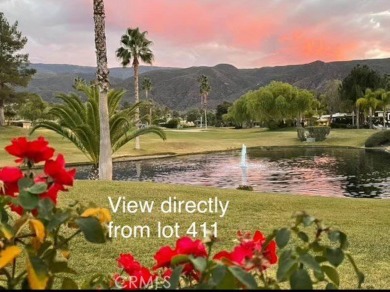 Arguably the most noticeable lot at the Ranch, lot 411 sits in on Rancho California RV Resort in California - for sale on GolfHomes.com, golf home, golf lot