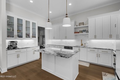 Like-new 3-bedroom, 2-bath home in Pinehurst of Lake Caroline on Lake Caroline Golf Club in Mississippi - for sale on GolfHomes.com, golf home, golf lot