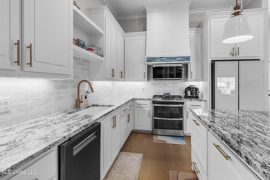 Like-new 3-bedroom, 2-bath home in Pinehurst of Lake Caroline on Lake Caroline Golf Club in Mississippi - for sale on GolfHomes.com, golf home, golf lot