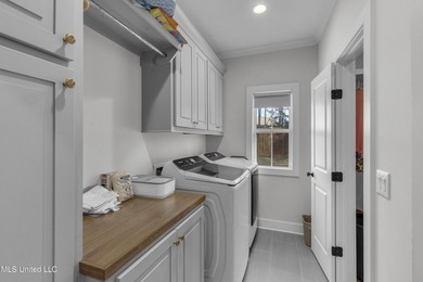 Like-new 3-bedroom, 2-bath home in Pinehurst of Lake Caroline on Lake Caroline Golf Club in Mississippi - for sale on GolfHomes.com, golf home, golf lot