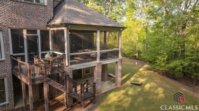 Wow! This is truly a remarkable property. Enter through the on The Georgia Club in Georgia - for sale on GolfHomes.com, golf home, golf lot