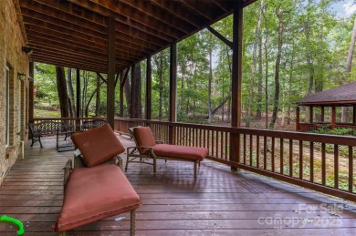 Welcome to this exquisite 7-bedroom, 6-bathroom residence on The Palisades Country Club in North Carolina - for sale on GolfHomes.com, golf home, golf lot