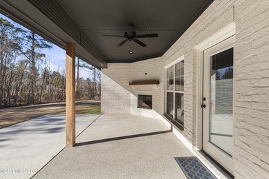 Like-new 3-bedroom, 2-bath home in Pinehurst of Lake Caroline on Lake Caroline Golf Club in Mississippi - for sale on GolfHomes.com, golf home, golf lot