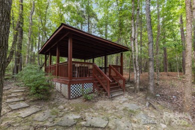 Welcome to this exquisite 7-bedroom, 6-bathroom residence on The Palisades Country Club in North Carolina - for sale on GolfHomes.com, golf home, golf lot