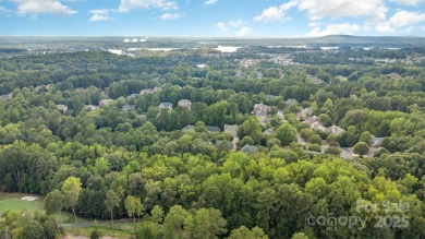 Welcome to this exquisite 7-bedroom, 6-bathroom residence on The Palisades Country Club in North Carolina - for sale on GolfHomes.com, golf home, golf lot