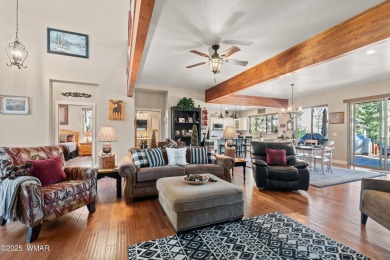 Discover timeless elegance and serene lake views in this on Pinetop Lakes Country Club in Arizona - for sale on GolfHomes.com, golf home, golf lot
