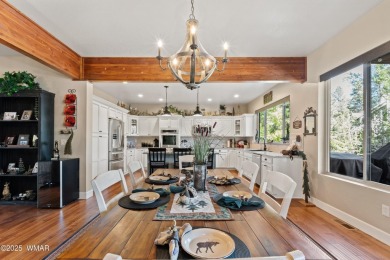 Discover timeless elegance and serene lake views in this on Pinetop Lakes Country Club in Arizona - for sale on GolfHomes.com, golf home, golf lot