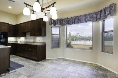 Stunning home with golf course and mountain views in gated adult on Robson Ranch Golf Club in Arizona - for sale on GolfHomes.com, golf home, golf lot