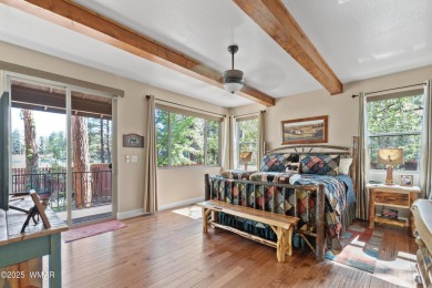 Discover timeless elegance and serene lake views in this on Pinetop Lakes Country Club in Arizona - for sale on GolfHomes.com, golf home, golf lot