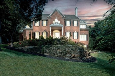 Custom built home on private, large, treed lot with lake views on Loch Lloyd Country Club in Missouri - for sale on GolfHomes.com, golf home, golf lot