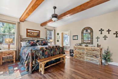 Discover timeless elegance and serene lake views in this on Pinetop Lakes Country Club in Arizona - for sale on GolfHomes.com, golf home, golf lot