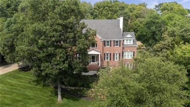 Custom built home on private, large, treed lot with lake views on Loch Lloyd Country Club in Missouri - for sale on GolfHomes.com, golf home, golf lot