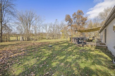 Sitting on 2.39 acres near Winona Lake and Stonehenge Golf on Stonehenge Golf Club in Indiana - for sale on GolfHomes.com, golf home, golf lot