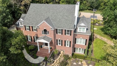Custom built home on private, large, treed lot with lake views on Loch Lloyd Country Club in Missouri - for sale on GolfHomes.com, golf home, golf lot