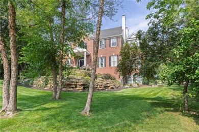 Custom built home on private, large, treed lot with lake views on Loch Lloyd Country Club in Missouri - for sale on GolfHomes.com, golf home, golf lot