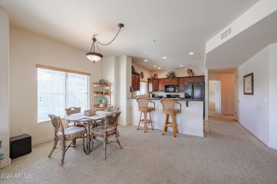 This top-floor condo is the perfect lock and leave living in a on Wildfire Golf Club in Arizona - for sale on GolfHomes.com, golf home, golf lot