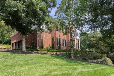 Custom built home on private, large, treed lot with lake views on Loch Lloyd Country Club in Missouri - for sale on GolfHomes.com, golf home, golf lot