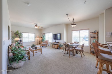 This top-floor condo is the perfect lock and leave living in a on Wildfire Golf Club in Arizona - for sale on GolfHomes.com, golf home, golf lot