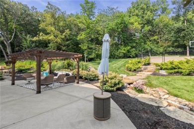 Custom built home on private, large, treed lot with lake views on Loch Lloyd Country Club in Missouri - for sale on GolfHomes.com, golf home, golf lot