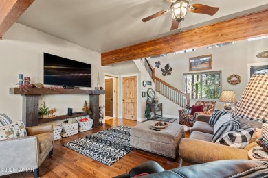 Discover timeless elegance and serene lake views in this on Pinetop Lakes Country Club in Arizona - for sale on GolfHomes.com, golf home, golf lot