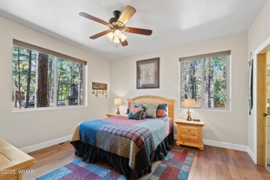 Discover timeless elegance and serene lake views in this on Pinetop Lakes Country Club in Arizona - for sale on GolfHomes.com, golf home, golf lot