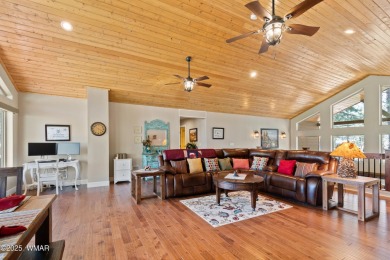 Discover timeless elegance and serene lake views in this on Pinetop Lakes Country Club in Arizona - for sale on GolfHomes.com, golf home, golf lot