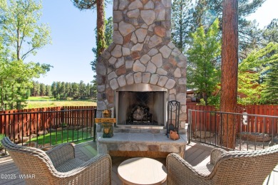 Discover timeless elegance and serene lake views in this on Pinetop Lakes Country Club in Arizona - for sale on GolfHomes.com, golf home, golf lot