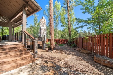 Discover timeless elegance and serene lake views in this on Pinetop Lakes Country Club in Arizona - for sale on GolfHomes.com, golf home, golf lot