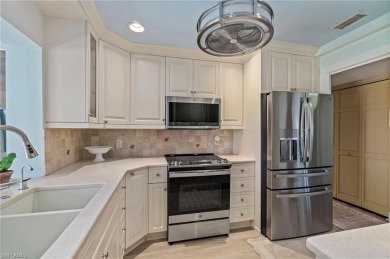 REMODELED VILLA - LAKE  GOLF COURSE VIEWS - LOW FEES! Enjoy on Lakewood Country Club in Florida - for sale on GolfHomes.com, golf home, golf lot