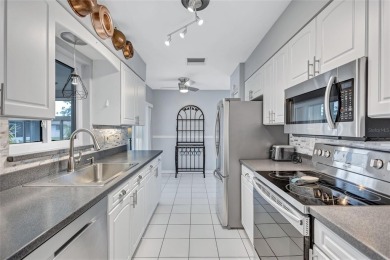 Welcome to your private Oasis.  This stunnng home features a on Highland Lakes Executive Golf Course in Florida - for sale on GolfHomes.com, golf home, golf lot