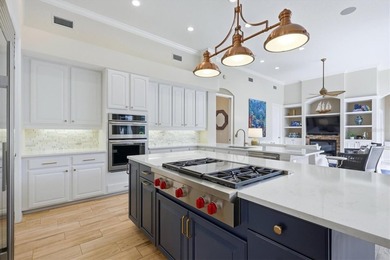 Step into a stunning, light-filled residence where elegance on University Park Country Club in Florida - for sale on GolfHomes.com, golf home, golf lot