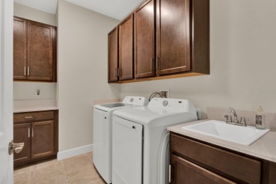 Located in the East Lakes 55+ community of Harmony, this on Harmony Golf Preserve in Florida - for sale on GolfHomes.com, golf home, golf lot